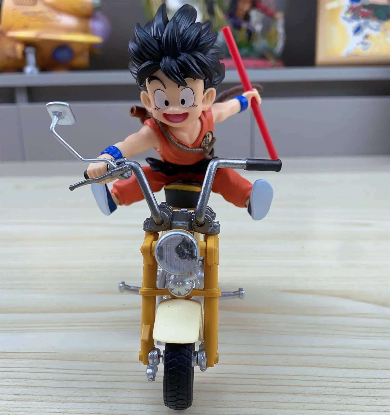Buy Dragon Ball Z Goku Riding Motorcycle Statue with Crypto at AnimeFigureHub
